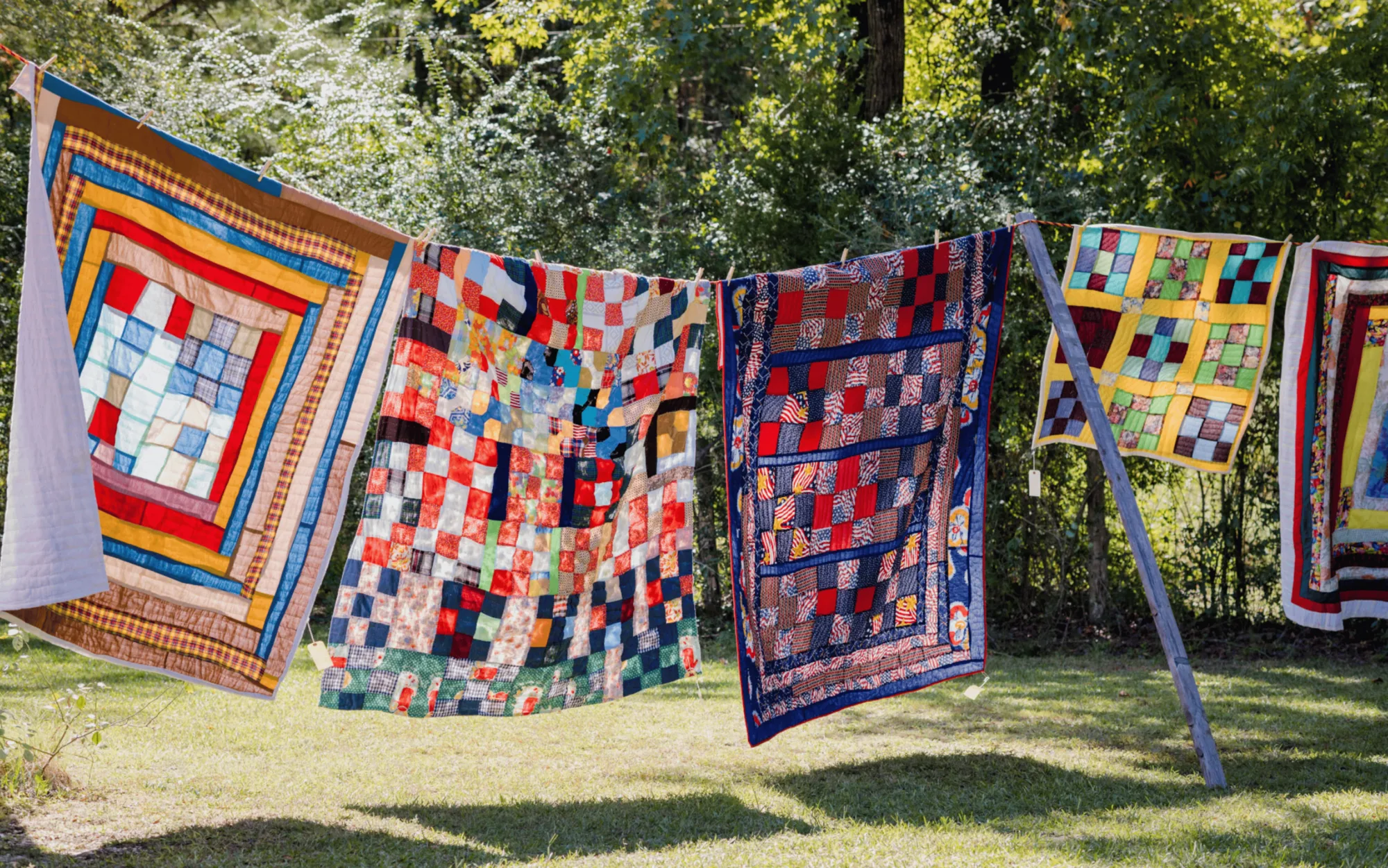 Gee's Bend quilts on a clothesline