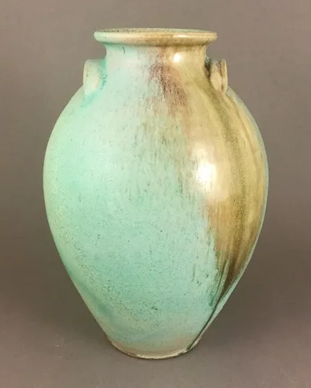 A green-glazed vase