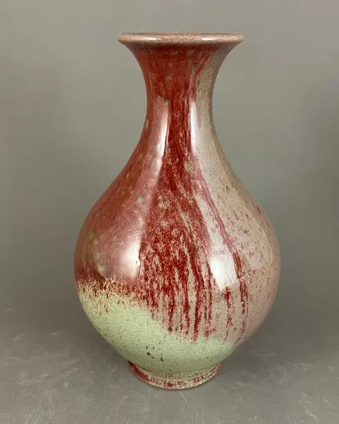 A red-glazed vase