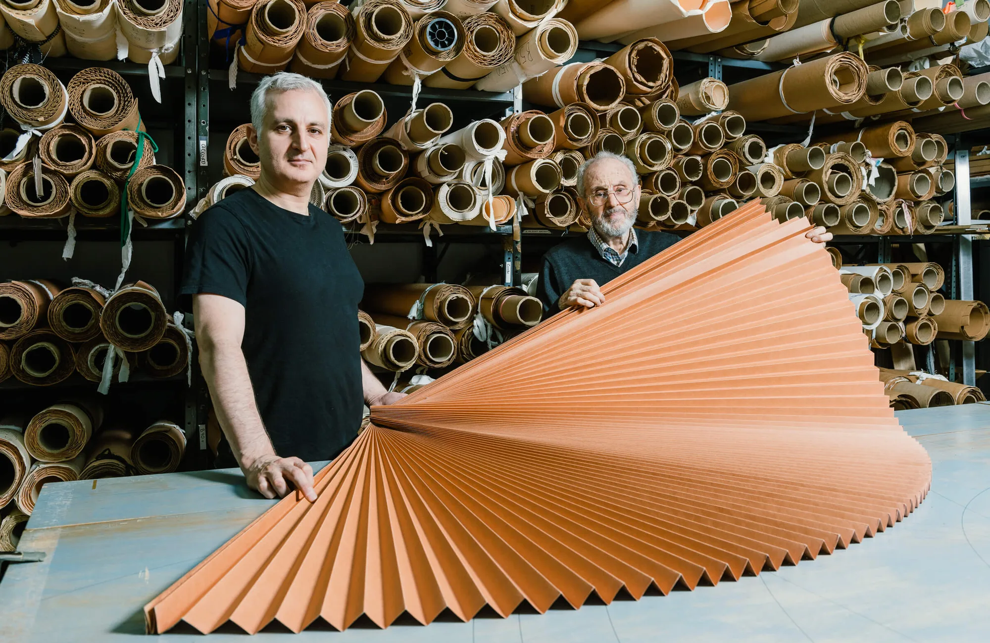George Kalajian with a pleated fan of fabric